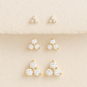 Brincos triplice flor cristal ouro